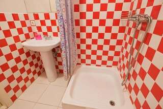 Хостелы Хостел Центр Винница Односпальная кровать в общем номере-21